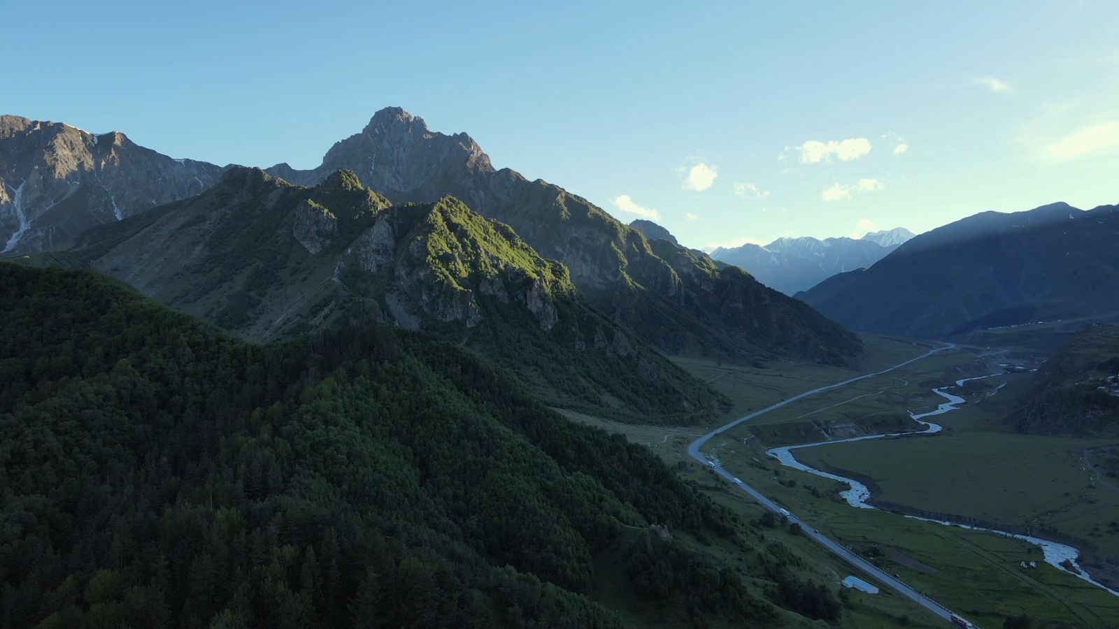 Aerial View of a Village in a Mountain Valley Free Stock Video Footage ...