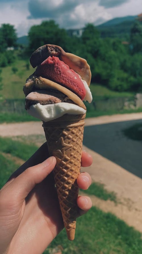 Person Holding an Ice Cream