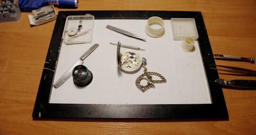 Tools and a Pocket Watch