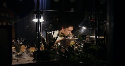 A Man Sitting at the Table