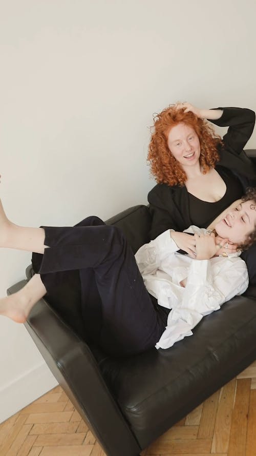 Women Sitting on a Couch