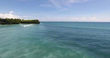 drone footage of people surfing