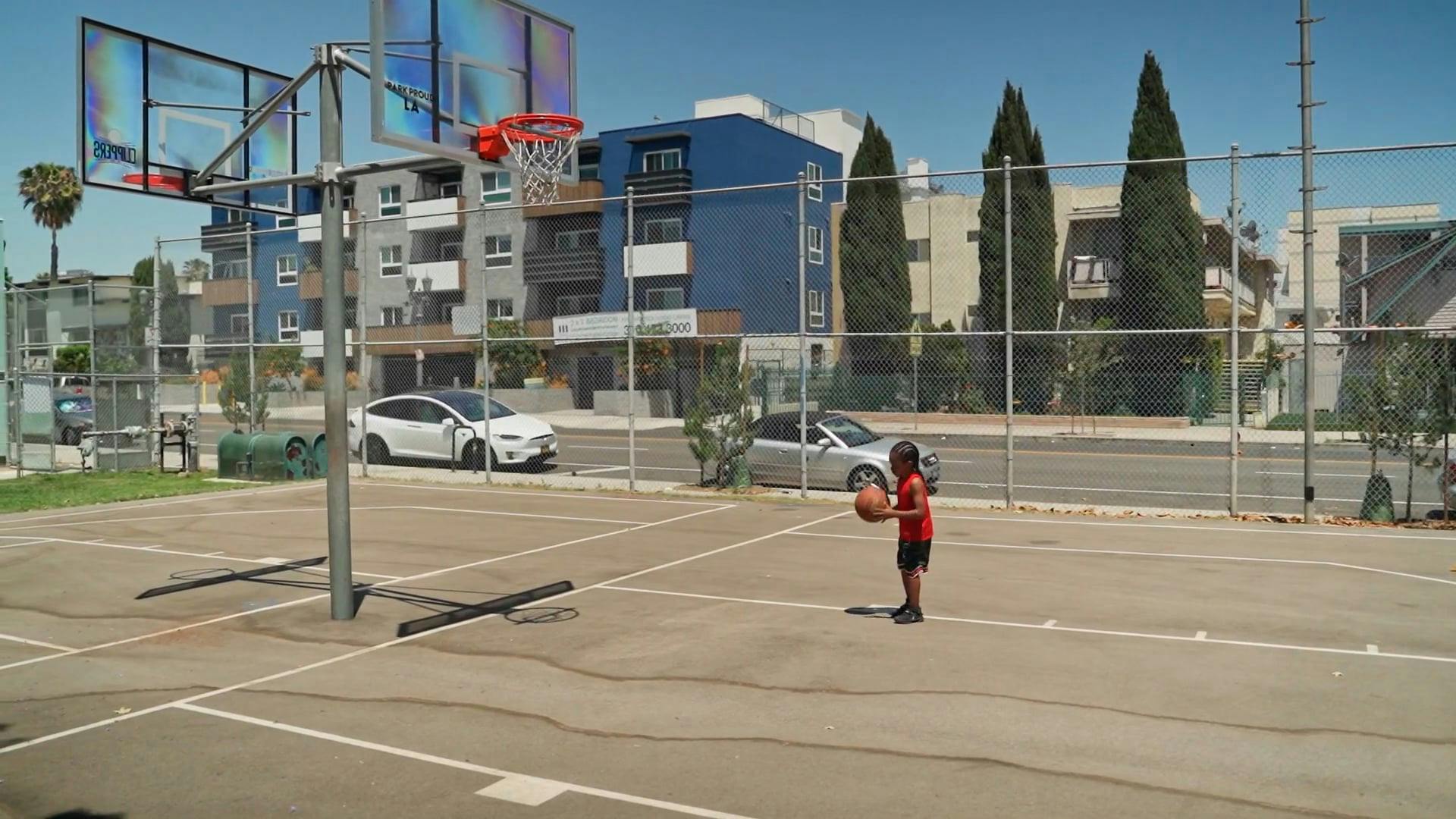 A Kid Throwing a Basketball on a Backboard Free Stock Video Footage, RoyaltyFree 4K & HD Video Clip