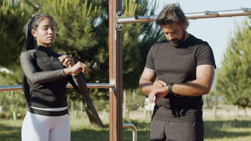 Man and Woman Getting Ready before Exercising