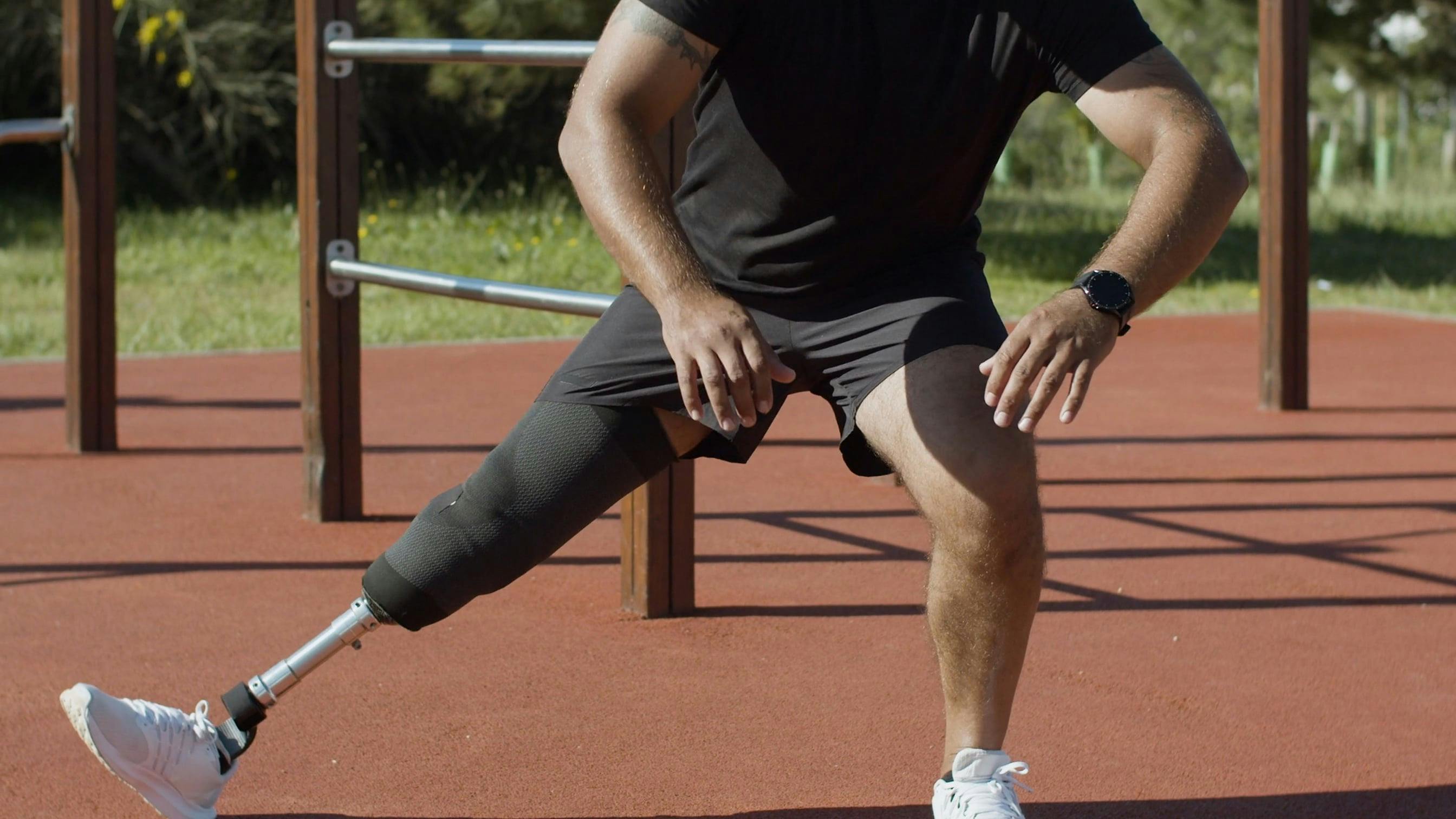 A Man With Prosthetic Leg is Exercising · Free Stock Video