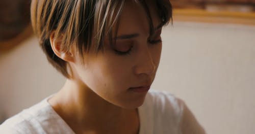 Close-up Footage of a Woman Playing a Handpan