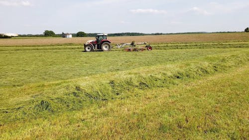 A Tractor Cutting Grass