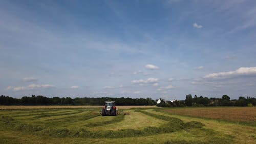 Tractor Driving on a Field