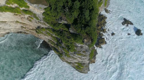 Top View of Breaking Waves on a Coastal Cliff 