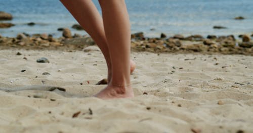 A Woman Standing on a Beach