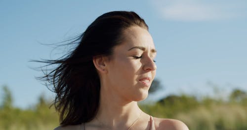 Close up of a Woman Posing on a Windy Day