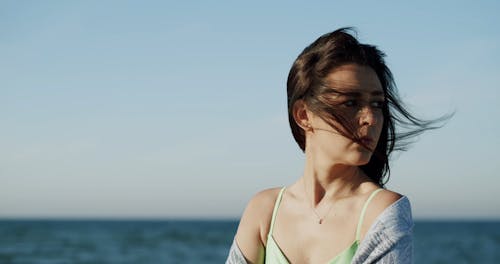 A Woman Posing on a Windy Day