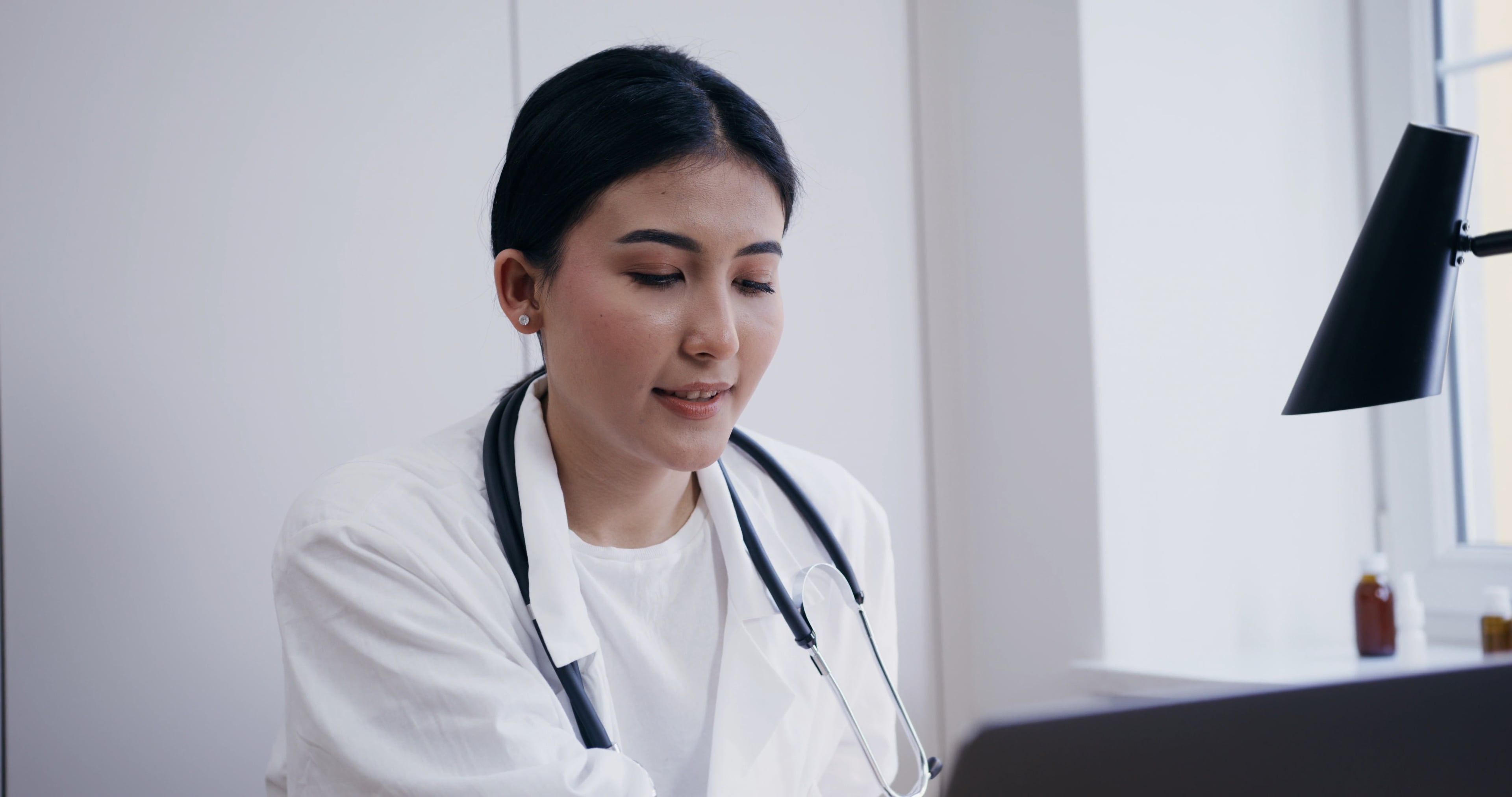 A Doctor Having Online Consultation on Her Laptop u00b7 Free Stock Video