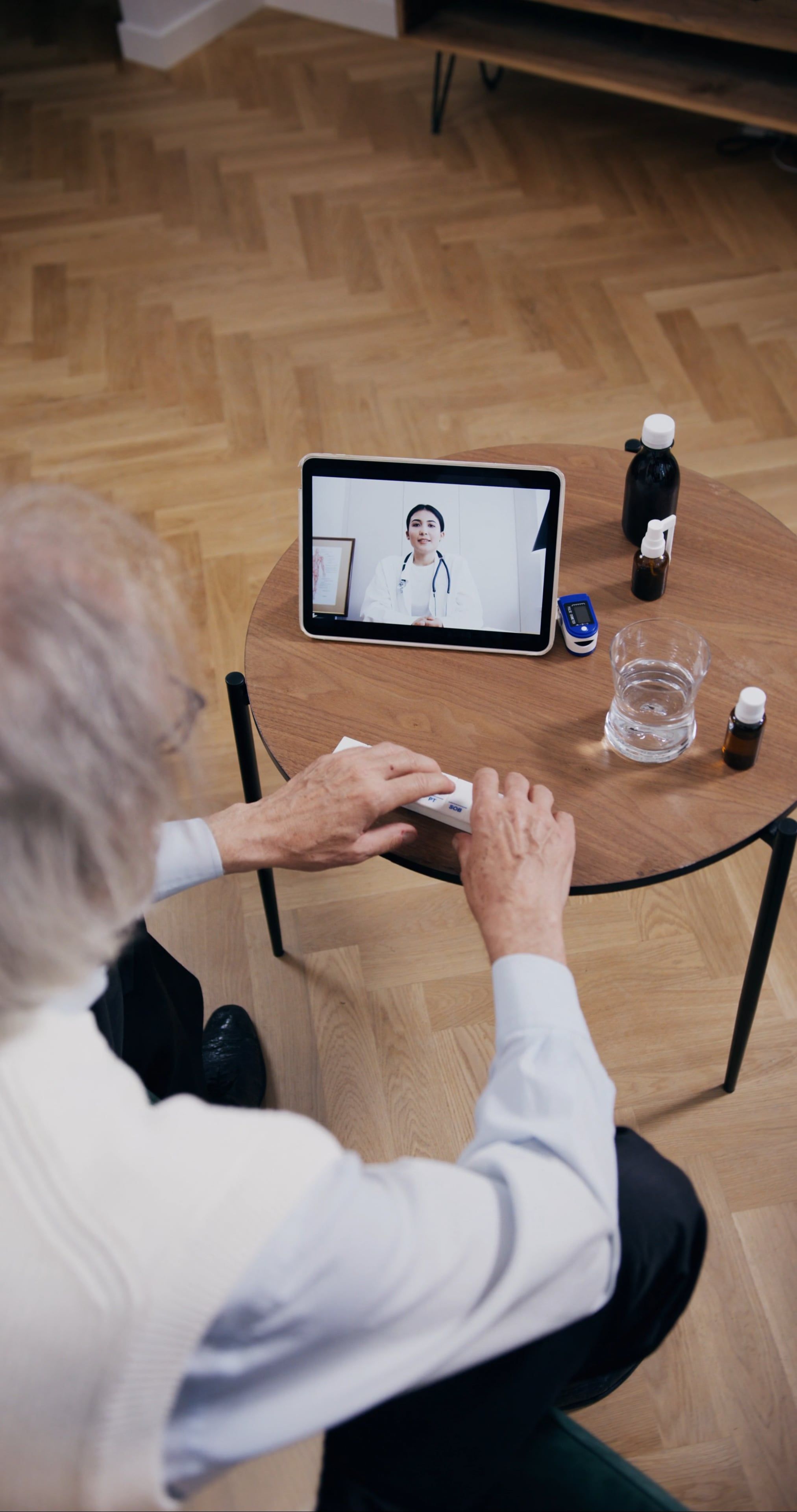 Man Taking His Medicine while on an Online Consultation · Free Stock Video