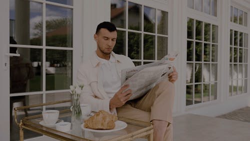 Man Reading a Newspaper