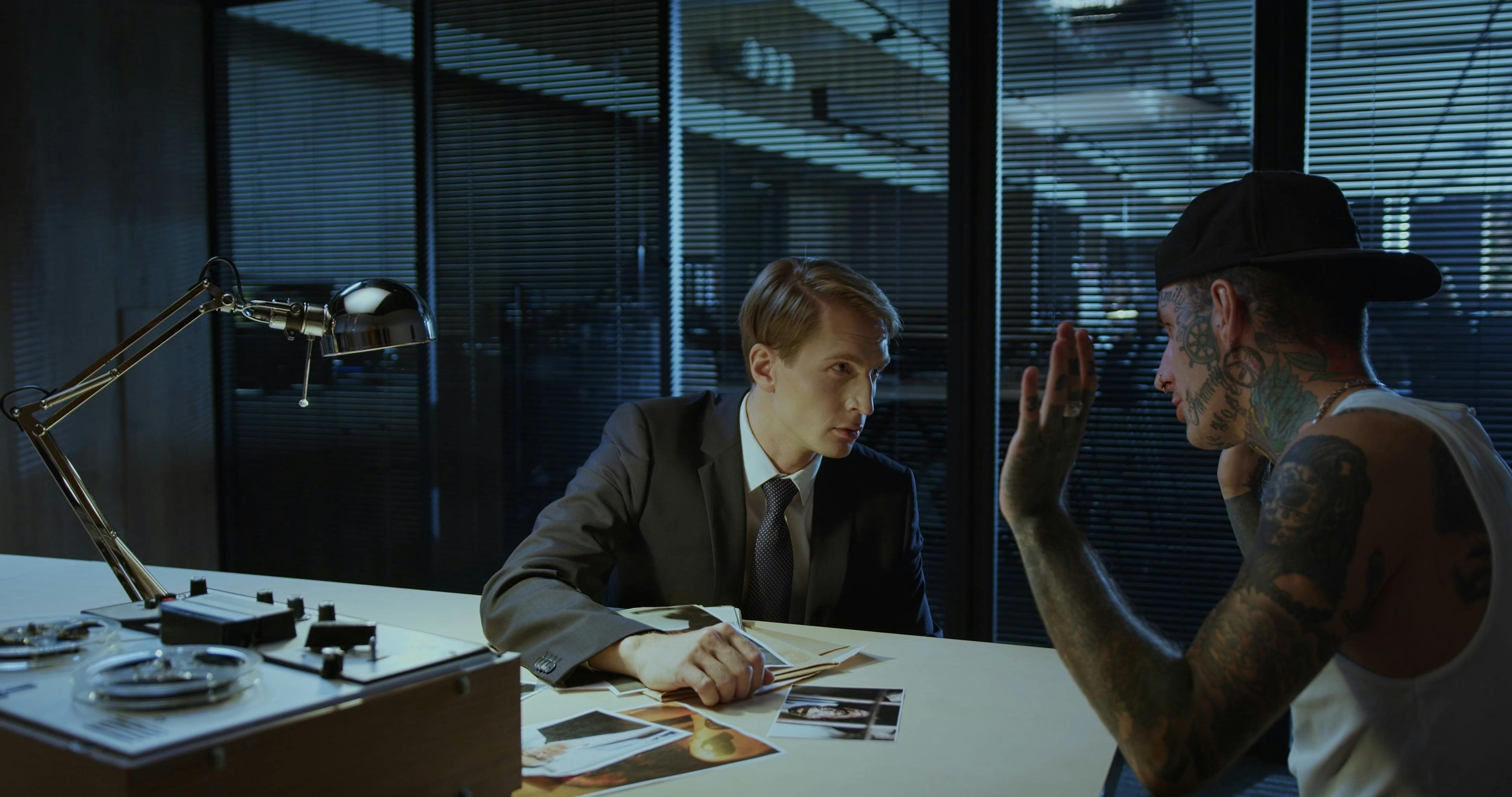 A Tattooed Person Walking Out of The Room Free Stock Video Footage