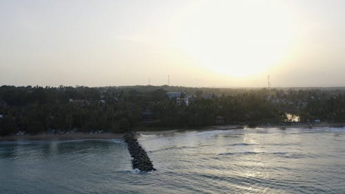 A Town Near Sea at Sunset