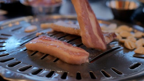 Person Cooking Pork