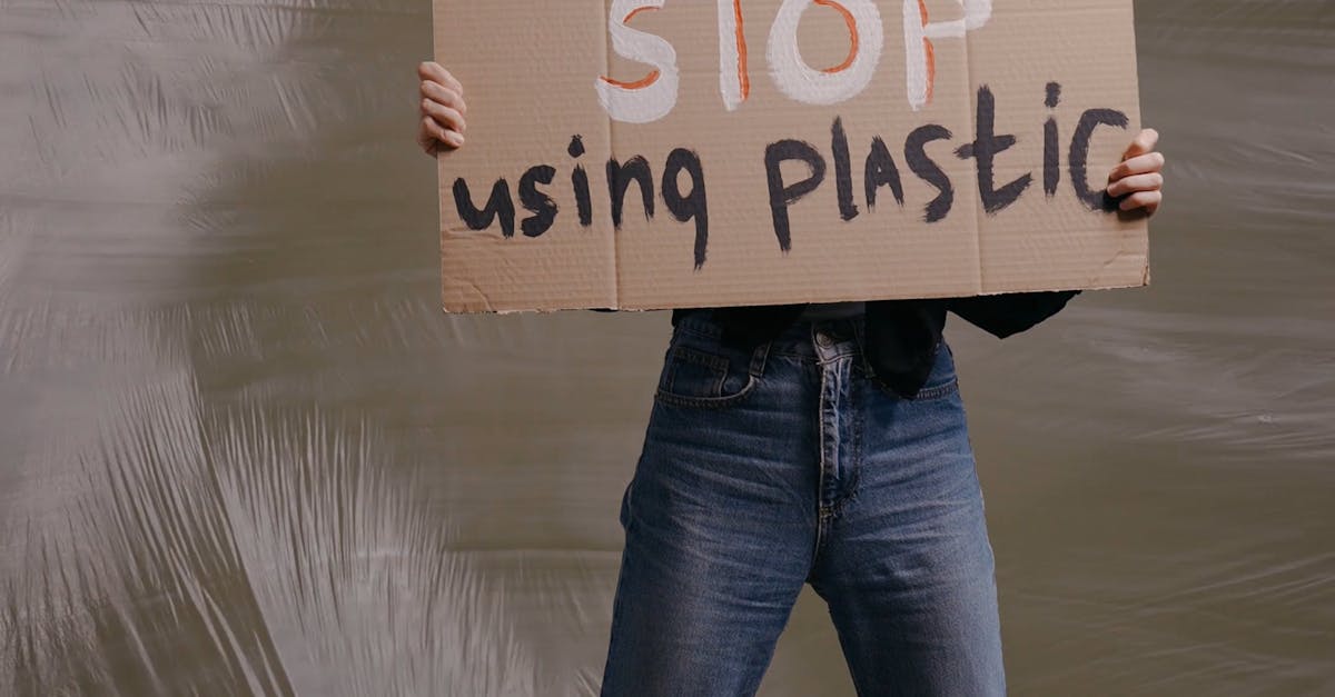 Woman Holding a Stop Using Plastic Poster Free Stock Video Footage ...