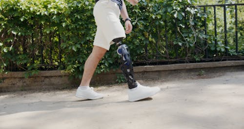 Person Wearing White Shoes Walking