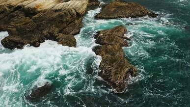 waves crashing on rocks