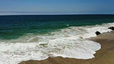waves crashing on shore
