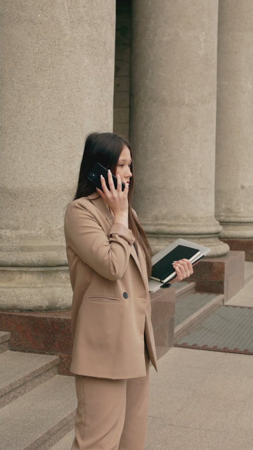 A Woman Talking On Her Cellphone