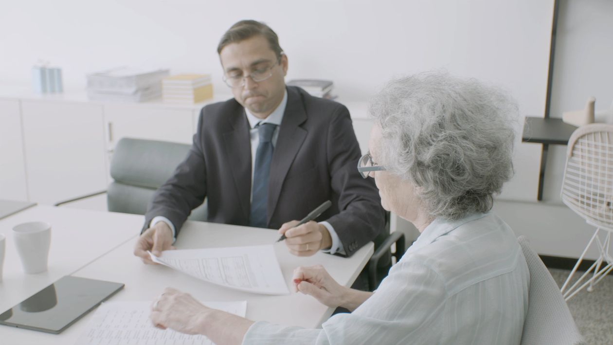 An Elderly Woman Signing a Contract Free Stock Video Footage, Royalty ...