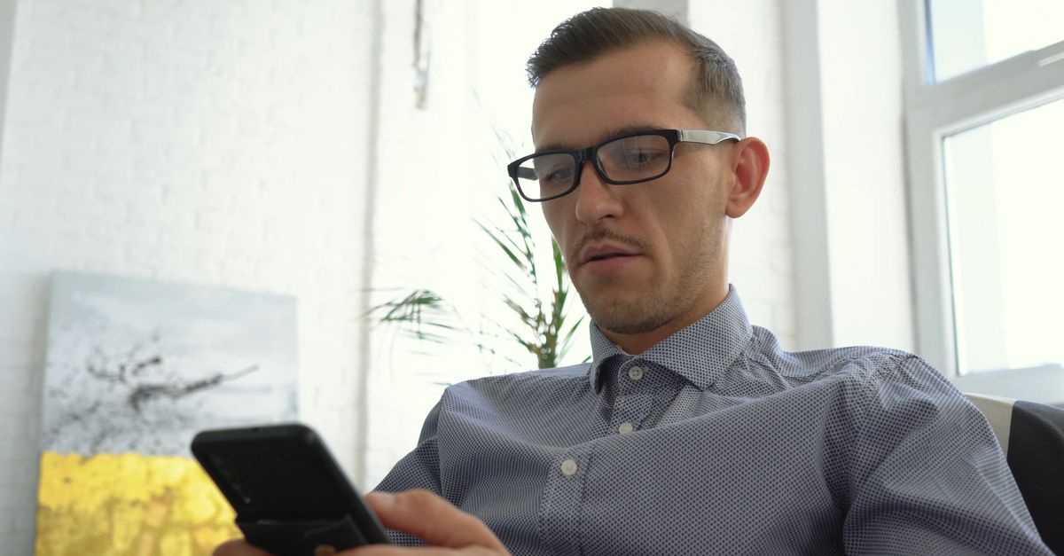 Man Using Device A Man using a Smartphone Free Stock Video Footage, Royalty-Free 4K & HD ...