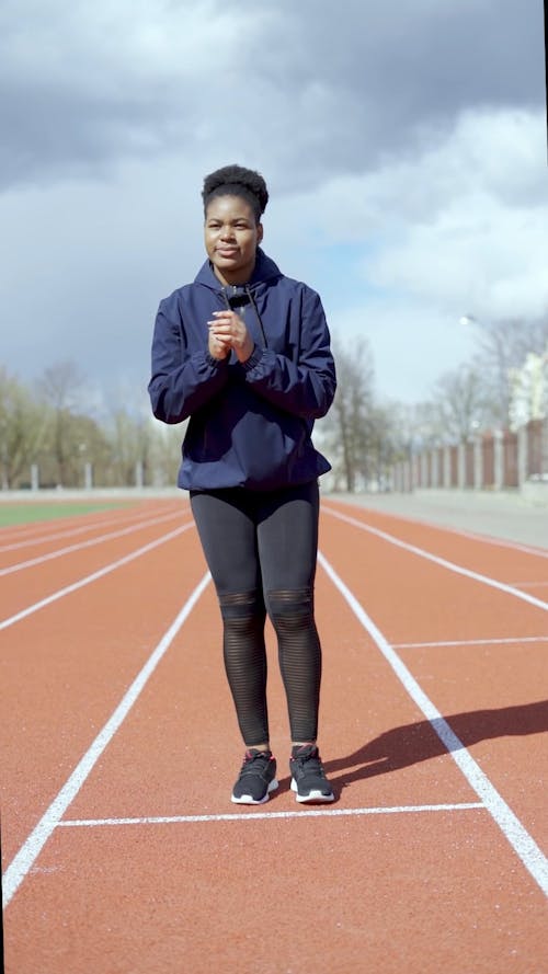 A Woman Doing Reverse Lunges