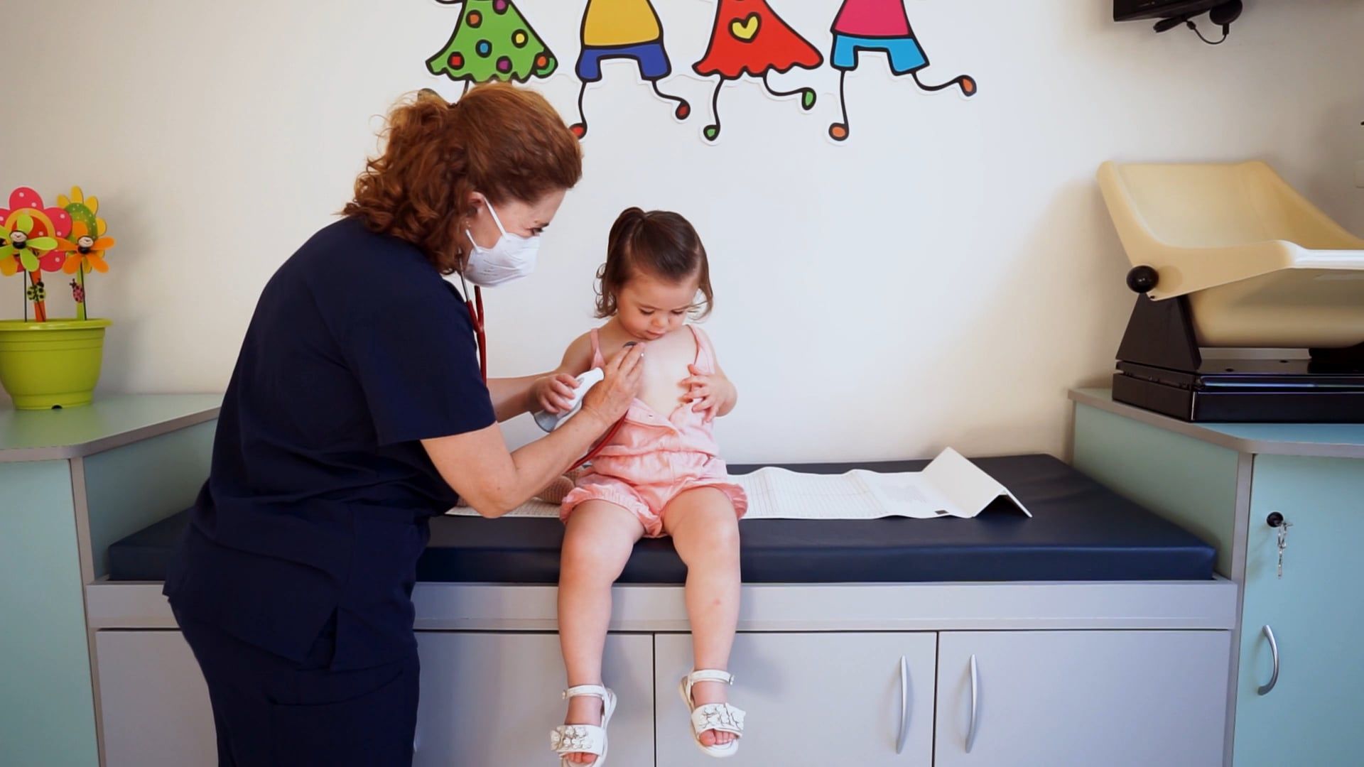 Pediatrician Using a Stethoscope on a Patient · Free Stock Video