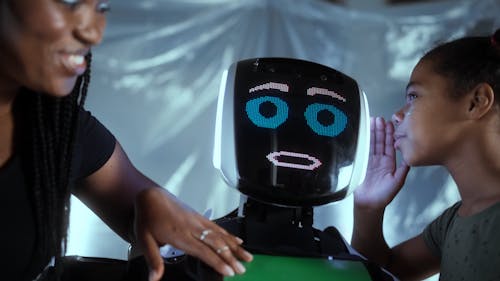 Video of Girl Whispering on a Robot