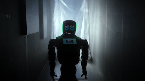 Dolly Shot of Robot on a Dark Room 