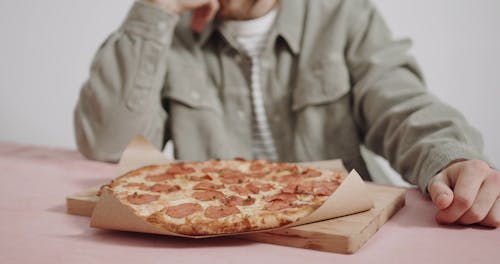 Man Eating Pizza Crust