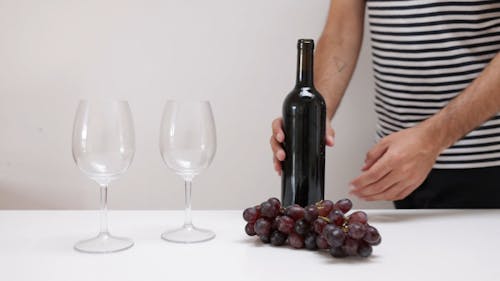 Man Pouring Wine in a Wine Glass