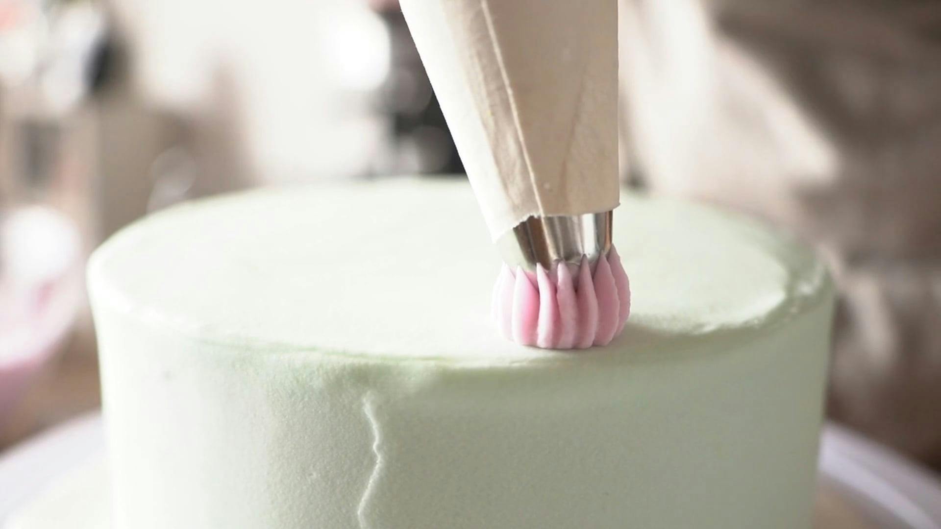 Person Putting Icing on Cake · Free Stock Video