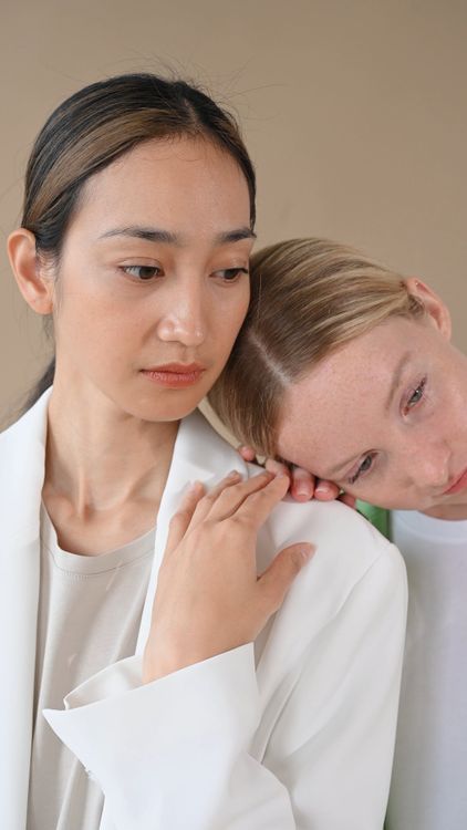 Forehead Rests Against Another Woman Resting Her Head on Another Woman's Shoulder Free Stock Video ...