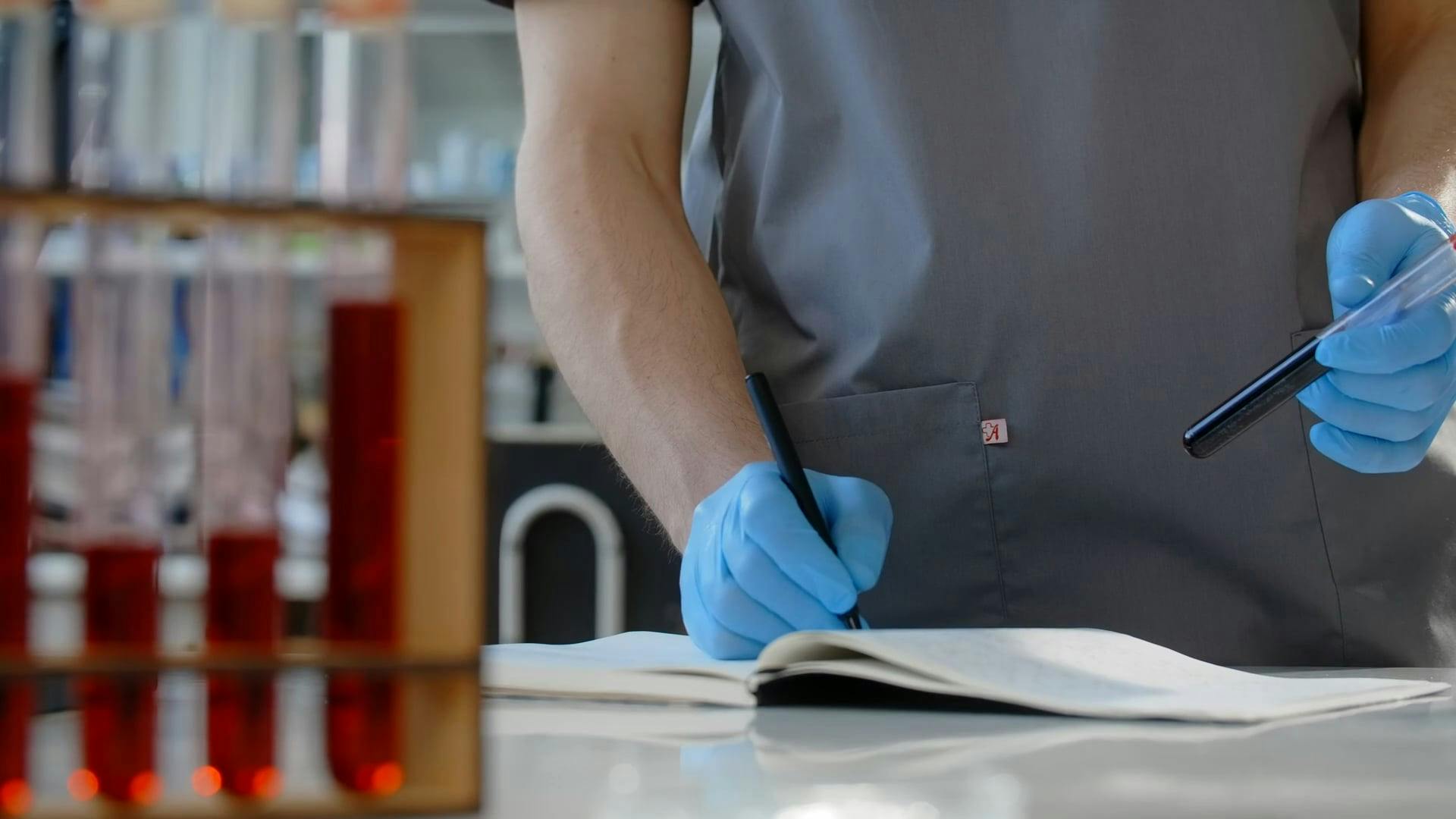 A Medical Practitioner Drawing Blood from a Patient · Free Stock Video