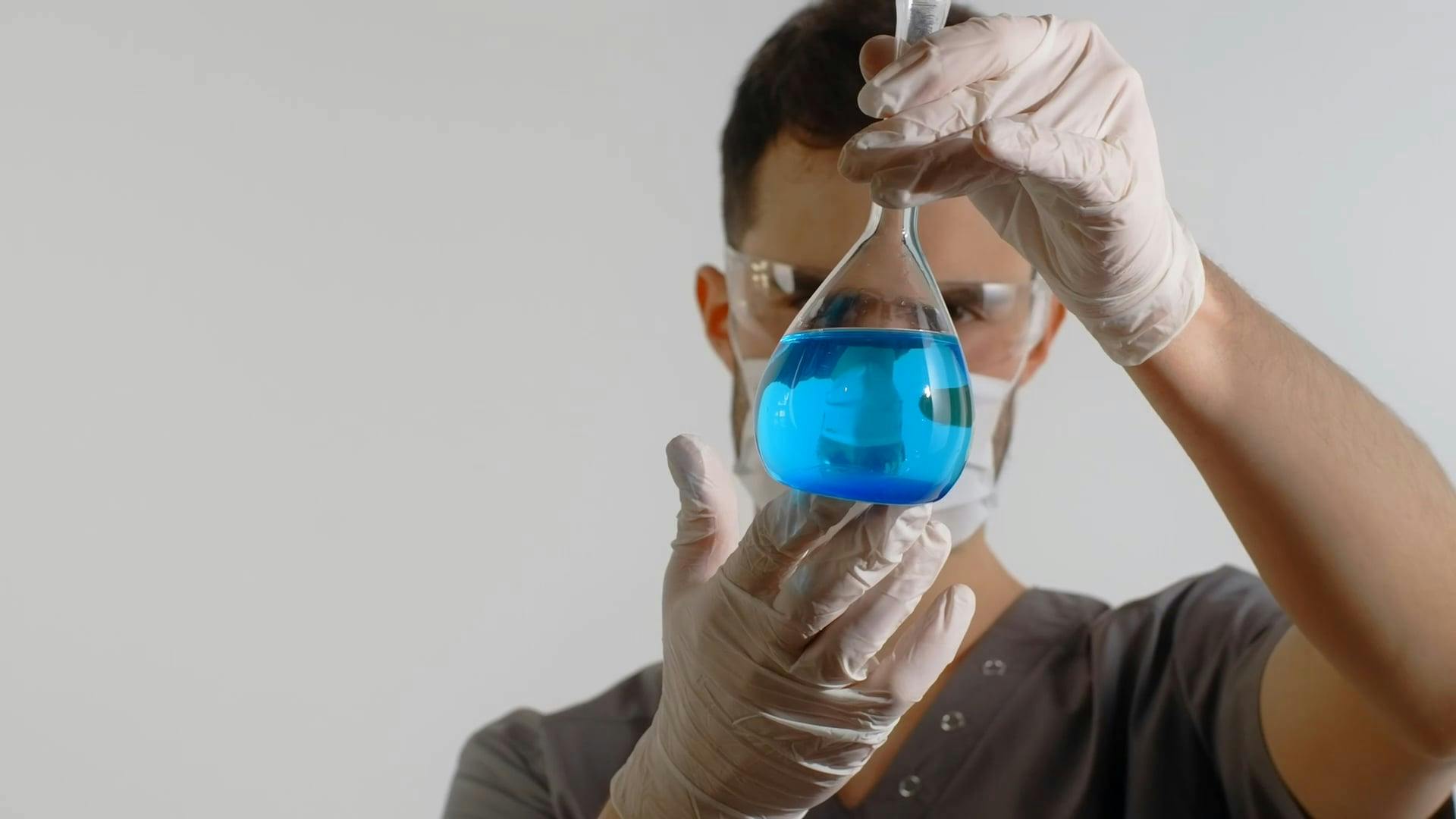 Chemists Organizing Chemistry Lab Equipment on a Table · Free Stock Video