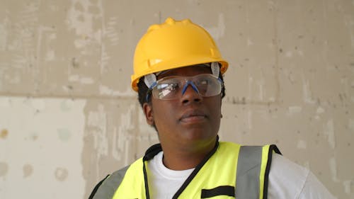 A Medium Close Up of a Woman Wearing Safety Gear