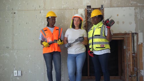 Female Construction Workers Posing Together