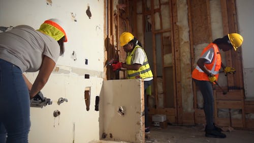 Female Construction Workers Working in a Room