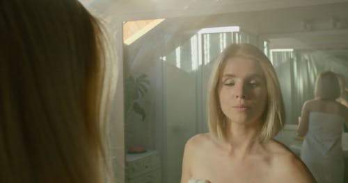 Woman Removing her Make Up