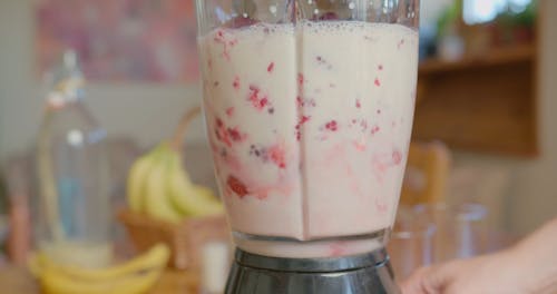 A Person Blending a Smoothie