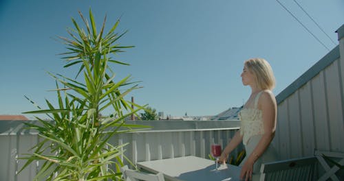 A Woman Drinking a Smoothie