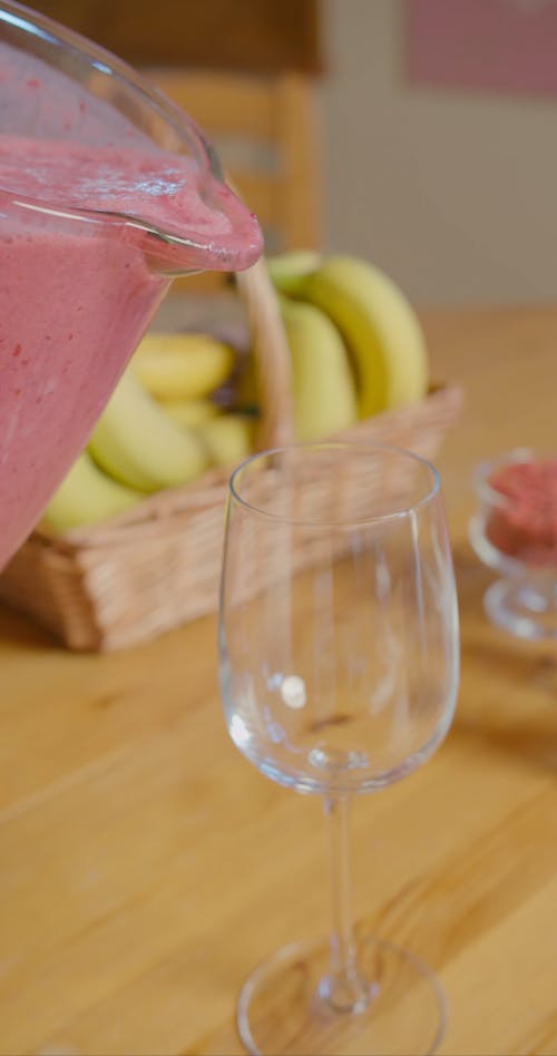 A Fruit Shake Being Poured into a Glass