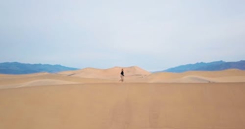 Person Running in a Desert