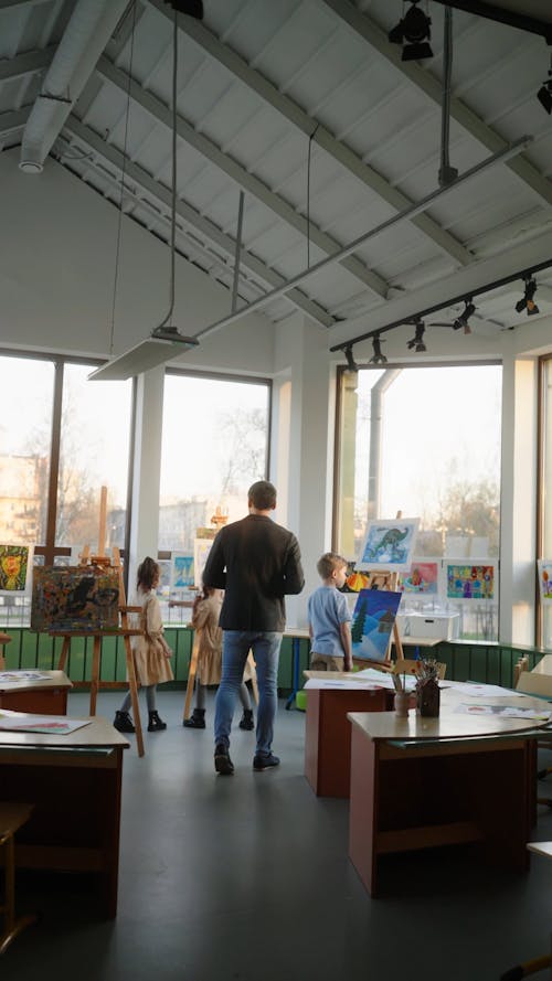 Teacher and Students in a Art Gallery