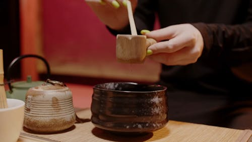 A Person Preparing Matcha