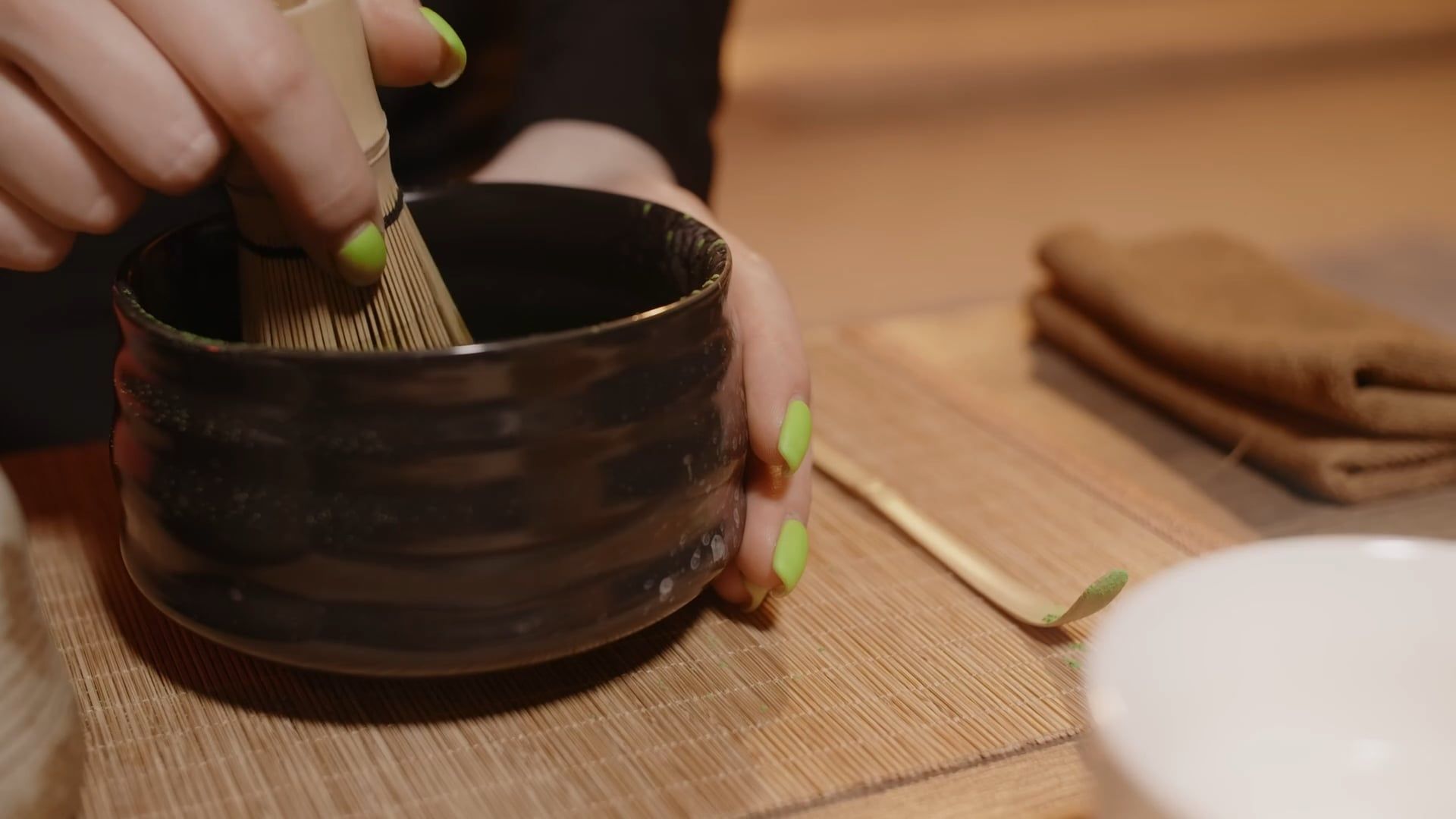 A Person Whisking the Tea on the Bowl · Free Stock Video